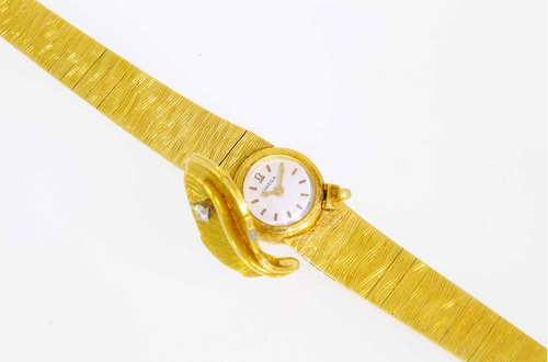 montre-omega-or-jaune-ouvert.jpg