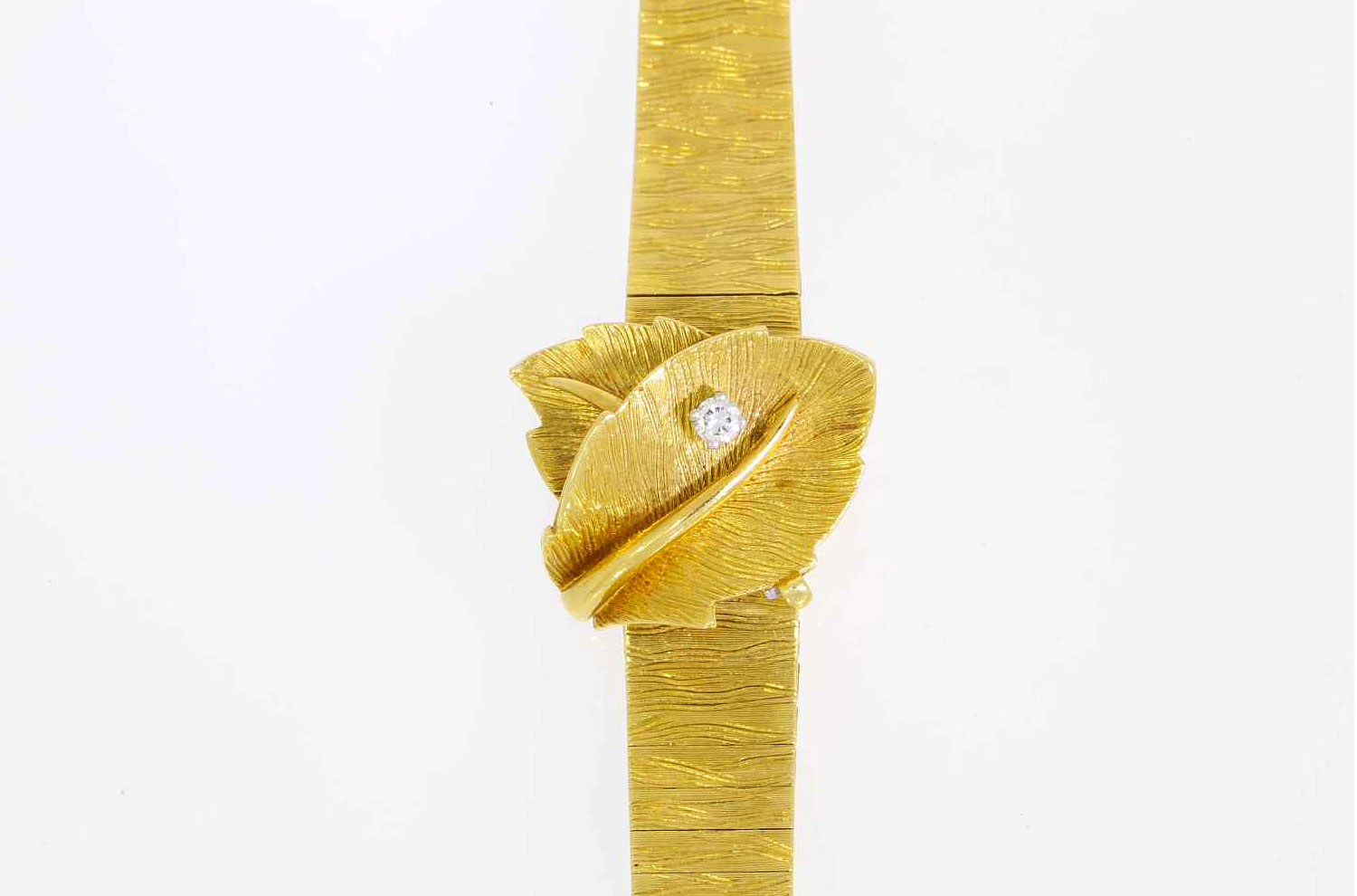 montre-omega-or-jaune-feuille.jpg