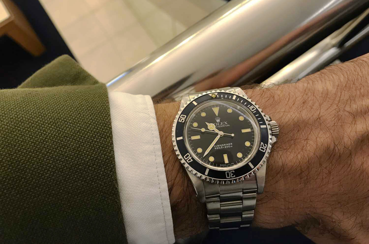 montre-rolex-submariner-l55-poignet.jpg